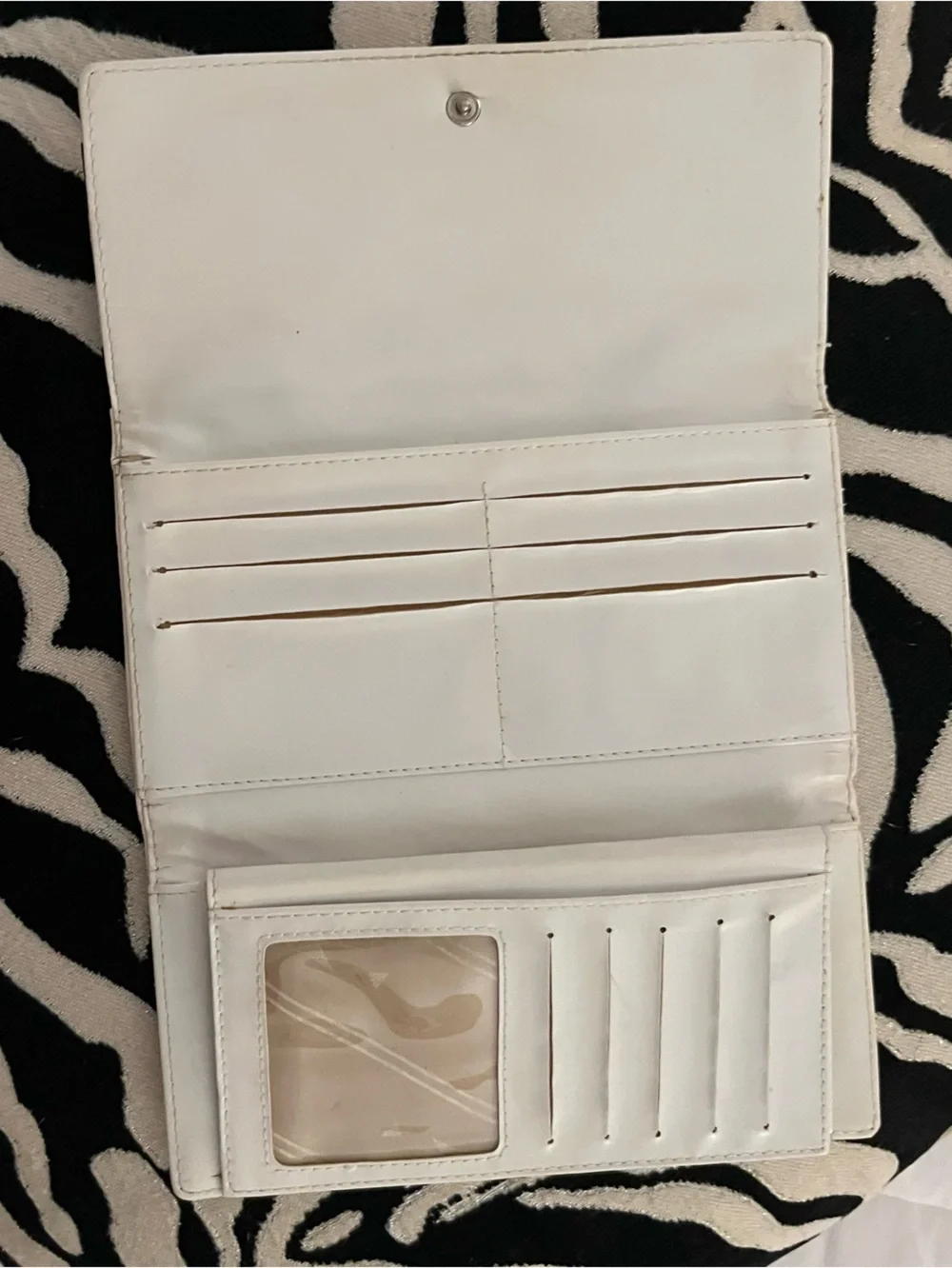 White Quilted Wallet with Black CC logo very nice wallet